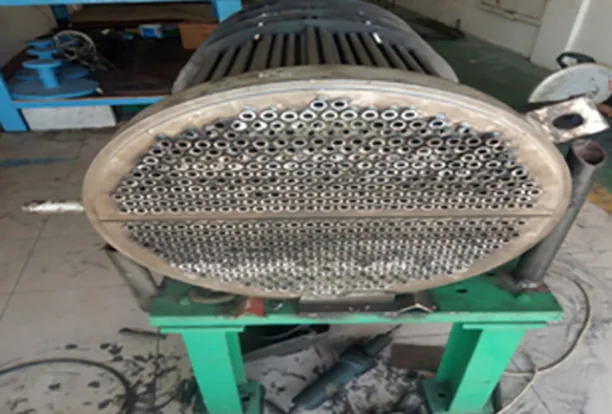 Technician inspecting heat exchanger